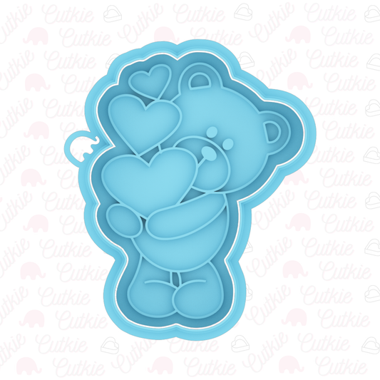 Oso con corazones