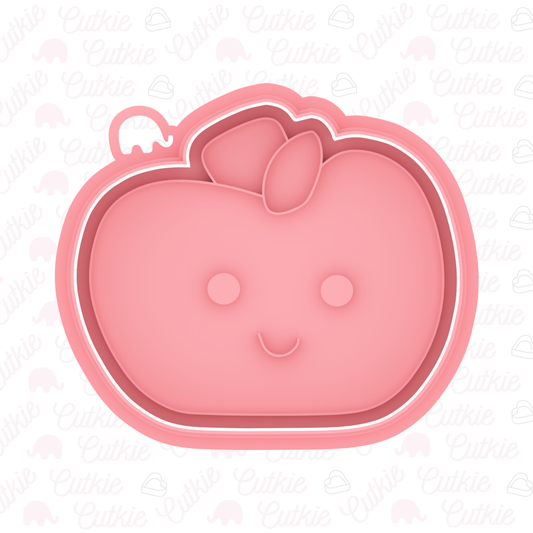 Manzana con sonrisa