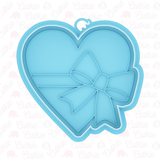 Corazón con moño