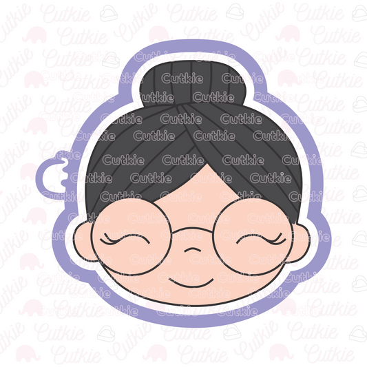 Abuelita con anteojos